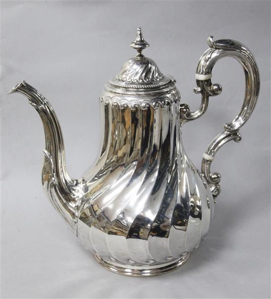 A French 950 standard silver wrythen fluted coffee pot, 20 oz.